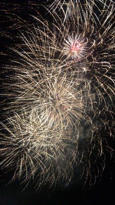 fireworks are lit up in the night sky with no people or lights on them as well