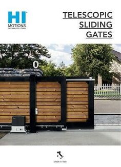 the front cover of a magazine with an image of a wooden fence and two metal gates