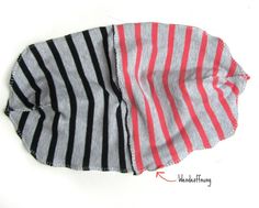 two pieces of fabric with red and black stripes