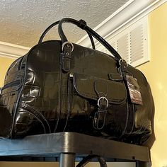 This Is A Nwt Sismod Large Duffel Bag. This Bag Is Really Big And Absolutely Beautiful. This Will Be Excellent For Your Next Flight Or Even Your Next Vacation To The Beach. Measurements For This Beautiful Bag Are As Follows “ 20 1/4” Wide X 15” Height X 9” Deep When Stuffed. This Is Not Stuffed To The Max, Just Enough To Hold Her Shape. Luxury Large Capacity Duffle Bag, Modern Black Weekender Bag For Shopping, Black Top Handle Travel Bag For Shopping, Black Travel Bag With Removable Pouch For Shopping, Chic Black Weekender Bag With Large Capacity, Elegant Black Satchel Travel Bag, Elegant Black Shoulder Bag With Luggage Sleeve, Elegant Black Top Handle Travel Bag, Black Satchel Travel Bag For Shopping