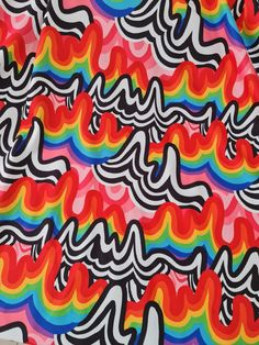 an image of a multicolored pattern with wavy lines and waves on the surface