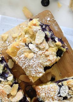 blueberry almond crumb bars on a cutting board