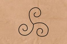 the letter s is drawn on top of a brown paper bag with black lines in it