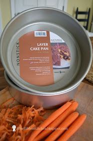 carrots and cake pan sitting on a cutting board