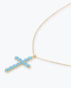 A classic design made to be the centerpiece of your look. With prong set simulated blue opals the "Oh She Fancy" Blue Opal Cross Pendant is a bright and meaningful reminder you can wear every day. DETAILS: Pendant Necklace Adjustable Length: 18" to 21" Pendant: 1.0" W x 1.5" L Lobster Clasp SKU: N6215 MATERIALS: 18k Gold Plated Over Brass Stone: 4mm Simulated Blue Opals Fancy Cross, Metal Jewelry Making, Pearl Necklace Earrings, Cross Jewelry, Blue Opal, Metal Jewelry, Cross Pendant, Chain Bracelet, Prong Setting