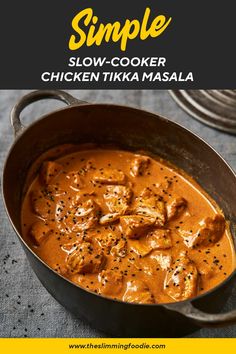 chicken tikka masala in a skillet with text overlay