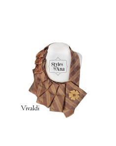 a brown and white plaid necktie with flowers on the collar, which says styles wana