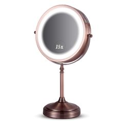 an illuminated mirror on a stand with the number 15x in it's center