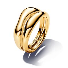 From Pandora, elevate your day-to-day look with the Organically Shaped Stacking Rings. This set of two 14k gold-plated rings features organically-shaped bands with a natural look created by varied thickness, protruding areas and a slightly convex shape. When stacked together, the intentional variations in the two bands create interesting gaps between them. Whether you style them together or separately, this pair of sterling silver stacking rings is a must-have for any ring lover's collection. Pa Gold Statement Rings, Trend 2025, Pandora Essence, Modern Wedding Rings, Pandora Ring, Sterling Silver Stacking Rings, Gold Statement Ring, Pandora Style, Silver Stacking Rings