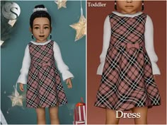 the doll is wearing a plaid dress and white shirt