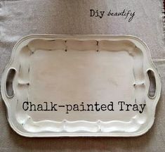 a white tray with the words chalk - painted tray on it