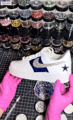 These are Cowboys inspired Air Force 1 sneakers  - Nike Air Force 1 sneakers  - Hand painted and sealed in navy blue - 300+ Applied matching Swarovski style rhinestones in translucent silver and navy blue - Blue star to also have rhinestones applied on navy blue and white portions - Ships in 5-7 business days ( Please message if needed sooner for expedited shipping options) - Ships from San Diego, CA ( Local San Diego customers generally receive their merchandise within 1 day after it has shippe Girly Custom Air Force 1, Luxury Navy Custom Sneakers With Cushioned Footbed, Bling Tennis Shoes, Mickey Shoes, Bling Nike Shoes, Air Force 1 Sneakers, Texas Football, Gem Art, Custom Air Force 1