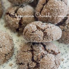 chocolate crinkle cookies stacked on top of each other