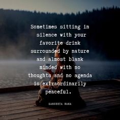 someone sitting on a dock with their back turned to the camera and texting, sometimes sitting in silence with your favorite drink surrounded by nature and almost blank