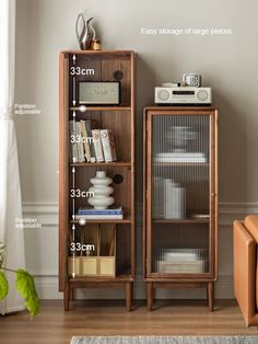 a living room with an entertainment center and bookshelf