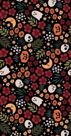 a black background with skulls and flowers