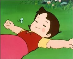 a cartoon boy laying on the ground with his arms out and eyes closed, smiling