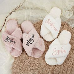 three pairs of slippers with personalized names on them