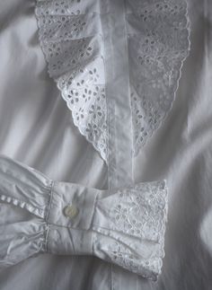 Vintage white lace women's blouse, from the 1990s era Victorian style, white blouse with a lavish ruffle lace front with eyelet floral embroidery and the same lace decorations on the cuffs. Slightly fitted body, looks great tucked into high waist jeans Material - missing tag, probably a cotton-polyester blend Size - marked 40 EU which is M. This is the vintage size, please look at measurements below to see if it will fit you: Approximate Measurements (taken when blouse lying flat, double armpit Style White Blouse, Lace Decorations, White Peasant Blouse, Blue White Top, Hippie Tops, White Lace Blouse, Lace Decor, Cottagecore Aesthetic, Blue Denim Jacket