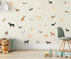 a child's room with dogs on the wall and toys in front of it