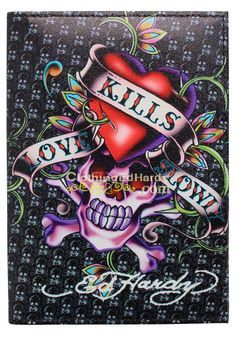 a skull and crossbones wallet with the words love is in the air on it