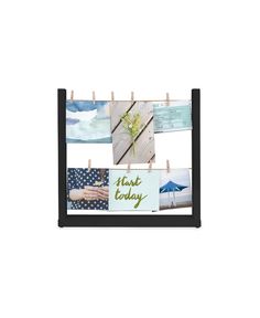 a black and white photo frame with photos hanging on clothes pins that say thank today