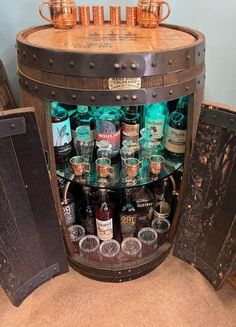 an old wooden barrel filled with lots of bottles