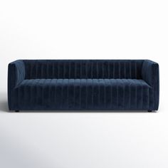 a dark blue velvet sofa with black legs and an open back, on a white background