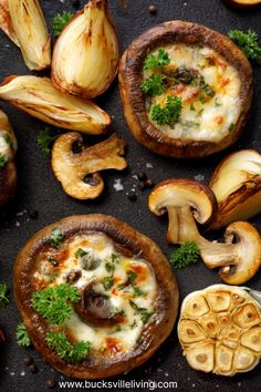 mushrooms with cheese and parsley on a black surface, surrounded by other food items