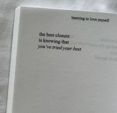 an open book with the words learning to love yourself written in black ink on it