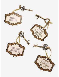 four key tags with the names of three different types of keys hanging from each other