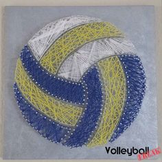 a drawing of a volleyball ball made out of string - work on paper with yellow and blue lines