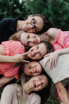 a group of young women standing next to each other