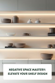 a shelf filled with bowls and plates on top of white shelves next to a wall