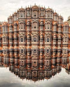 an image of a building that is made out of buildings in the middle of water