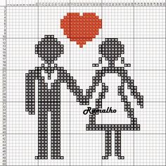 a cross stitch pattern with two people holding hands and an orange heart in the middle