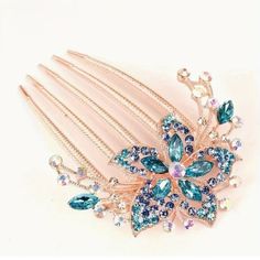 Beautiful Floral Hair Comb In Gold With Blue And Iridescent Crystals And Rhinestones. Measures Appr. 3.5" X 2.5". New To Poshmark? Use Code Emmiesbling For $10 Off Your Purchase When You Open A New Account. Check Out My Other Listings If You Like Boho Hippie 60’s 70’s 80’s 90’s Y2k Retro Mcm Pin-Up Beach Western Pool Coachella Festival Southwestern Bohemian Vintage Ig Instagram Tik Tok Gypsy Spell Vici Nasty Gal, Misguided, House Of Cb, Quay, Windsor, Lulus, H&M, Forever 21, Free People, , Booho Bride Hair Pins, Crystal Bridal Headpiece, Hair Comb Clips, Diamond Hair, Tiaras Jewellery, Rhinestone Hair Comb, Floral Hair Clip, Rhinestone Hair Pin, Tiara Hairstyles