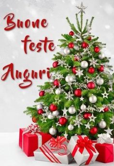 a christmas tree with presents under it and the words above it that reads, buone feste august