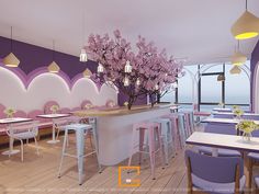 the interior of a restaurant with purple and white decor