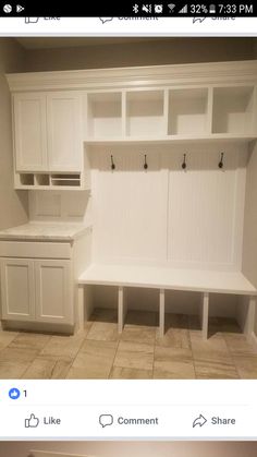 two pictures of the same room with white cabinets and bench in it, one is empty