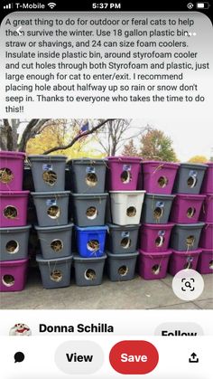 a bunch of buckets that are stacked on top of each other in front of a tree