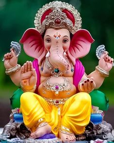 an elephant statue sitting on top of a table