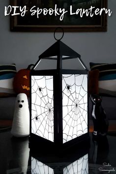 a halloween lantern sitting on top of a table