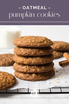 oatmeal pumpkin cookies stacked on top of each other with cinnamon in the background