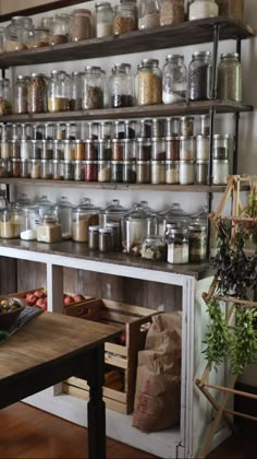 the shelves are filled with many different types of spices and herbs, including garlics