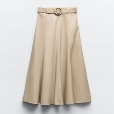 *New With Tags!* High Waist Midi Skirt With Belt Loops. Belt With Braided Self-Lined Buckle. Side Hidden In-Seam Zip Closure. Color: Sand Outer Shell Base Fabric 100% Polyester Coating 100% Polyurethane Pat Dry. Elegant Zara Skirt For Fall, Elegant Zara Midi Skirt, Spring Knee-length Leather Skirt, Elegant Beige Belted Skirt, Elegant Beige Leather Bottoms, Zara Flared Skirt For Workwear, Zara Flared Skirt For Fall, Leather Flared Skirt For Spring, Spring Leather Flared Skirt