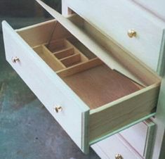 the drawers are open and ready for someone to use them in their crafting projects