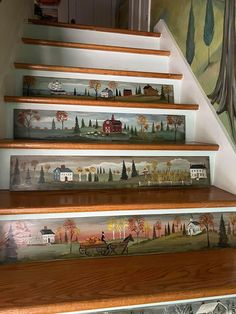 some stairs painted with different scenes on them