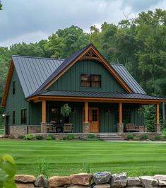 a large green house sitting on top of a lush green field