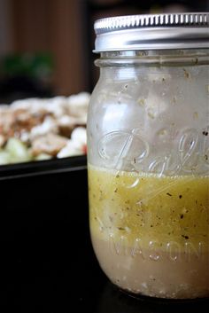 a jar filled with food sitting on top of a table